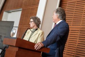 Dr. Julea Garner and Dr. Stan Kellar make opening remarks at the Family Medicine Residency graduation ceremony.