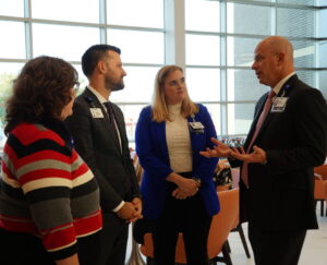 Teresa, Amberlie, Cody Walker, and Troy Wells speak at Dr. Kellars send off party.