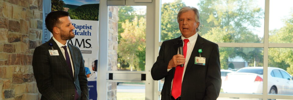 Dr. Kellar gives a speech next to Cody Walker at his send off party.